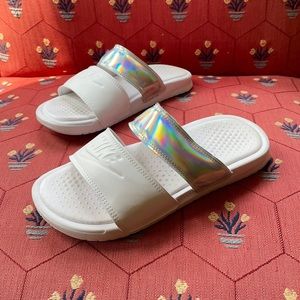 Nike slides. White with holographic silver strap